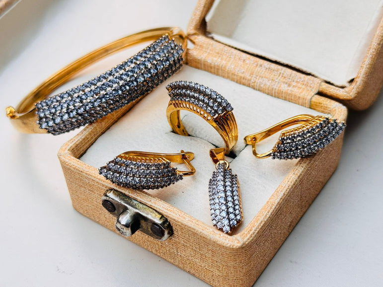18 KARAT GOLD PLATED WITH REAL ZIRCONS