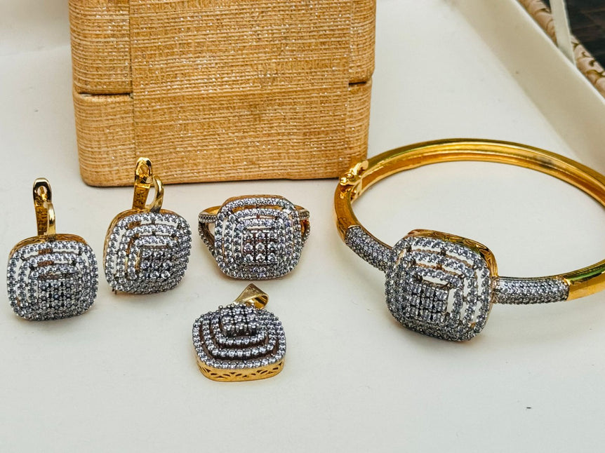 18 KARAT GOLD PLATED WITH REAL ZIRCONS