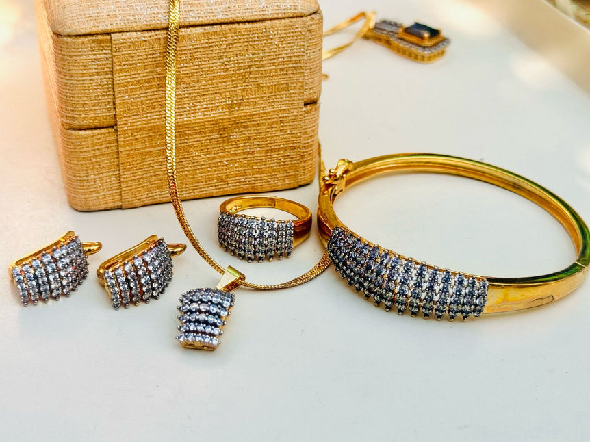 18 KARAT GOLD PLATED WITH REAL ZIRCONS