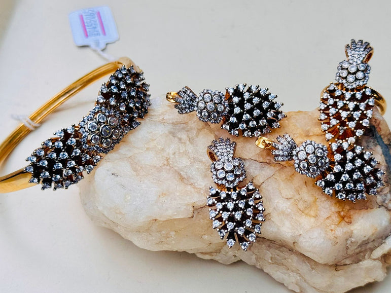 18 KARAT GOLD PLATED WITH REAL ZIRCONS