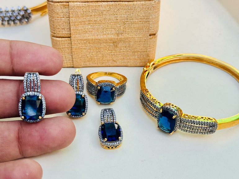 18 KARAT GOLD PLATED WITH REAL ZIRCONS