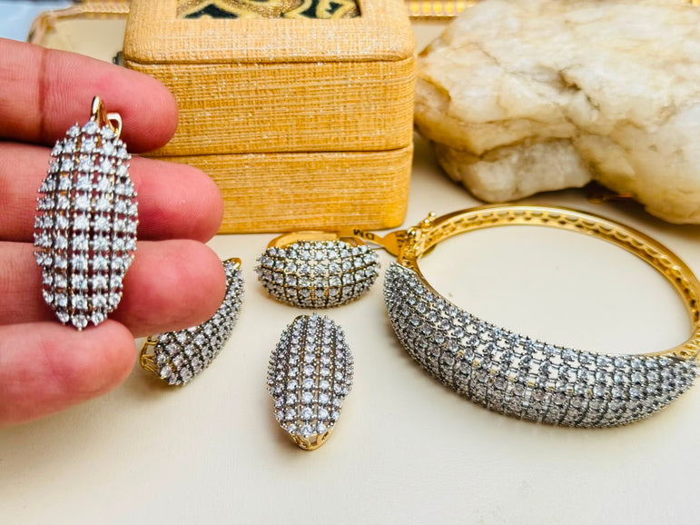 18 KARAT GOLD PLATED WITH REAL ZIRCONS