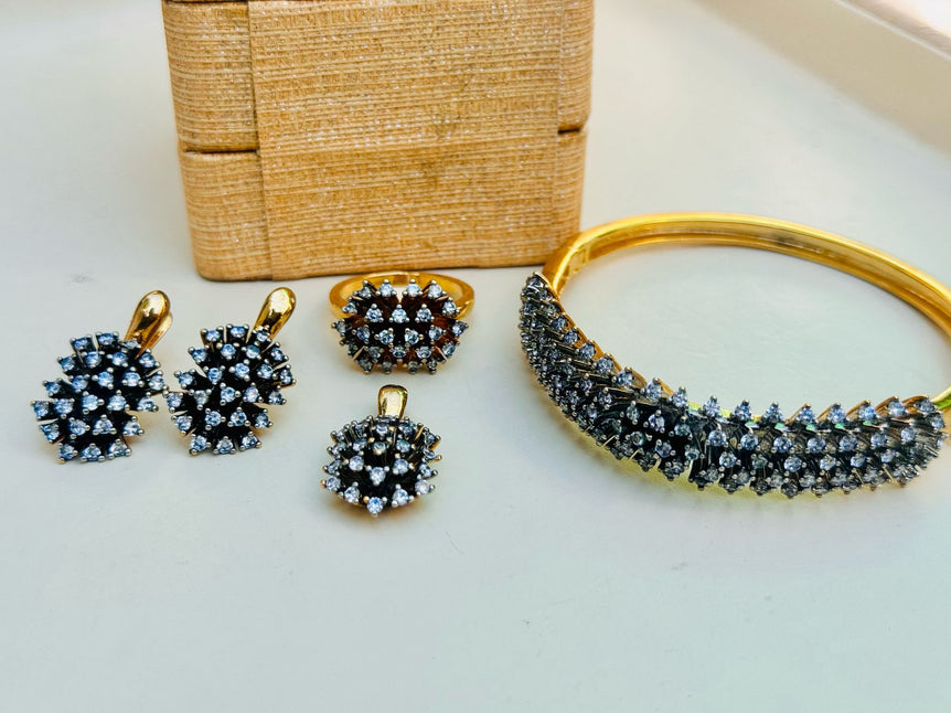 18 KARAT GOLD PLATED WITH REAL ZIRCONS