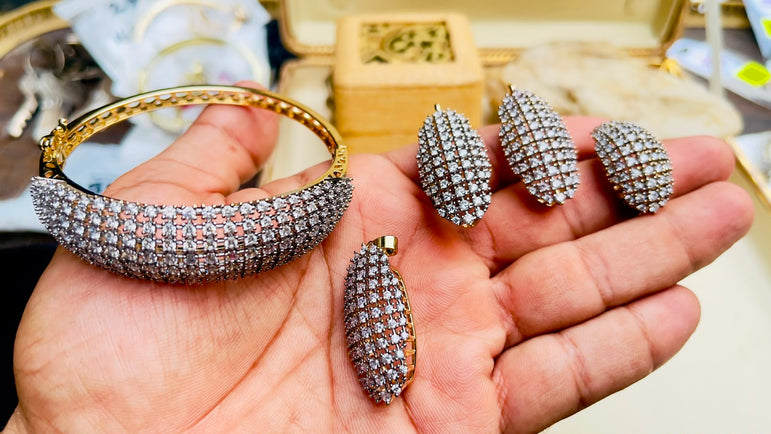 18 KARAT GOLD PLATED WITH REAL ZIRCONS