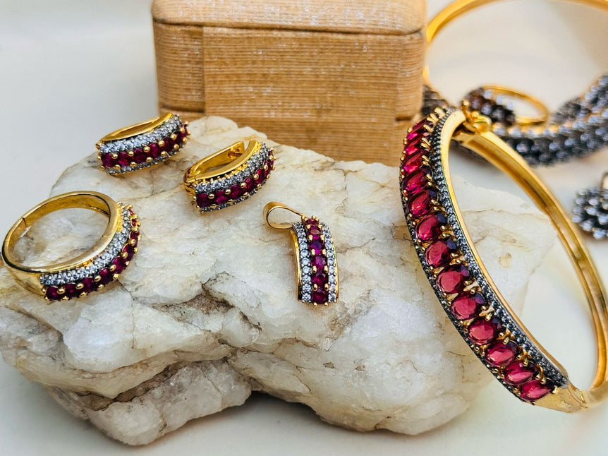 18 KARAT GOLD PLATED WITH REAL ZIRCONS