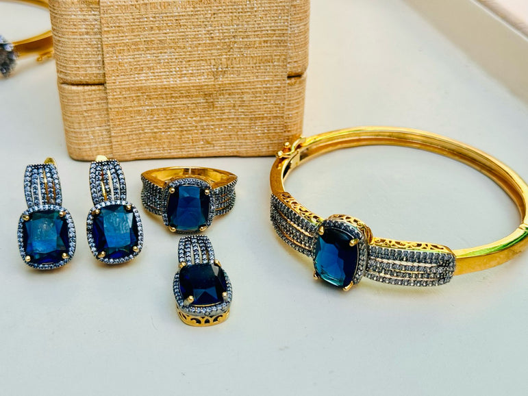 18 KARAT GOLD PLATED WITH REAL ZIRCONS