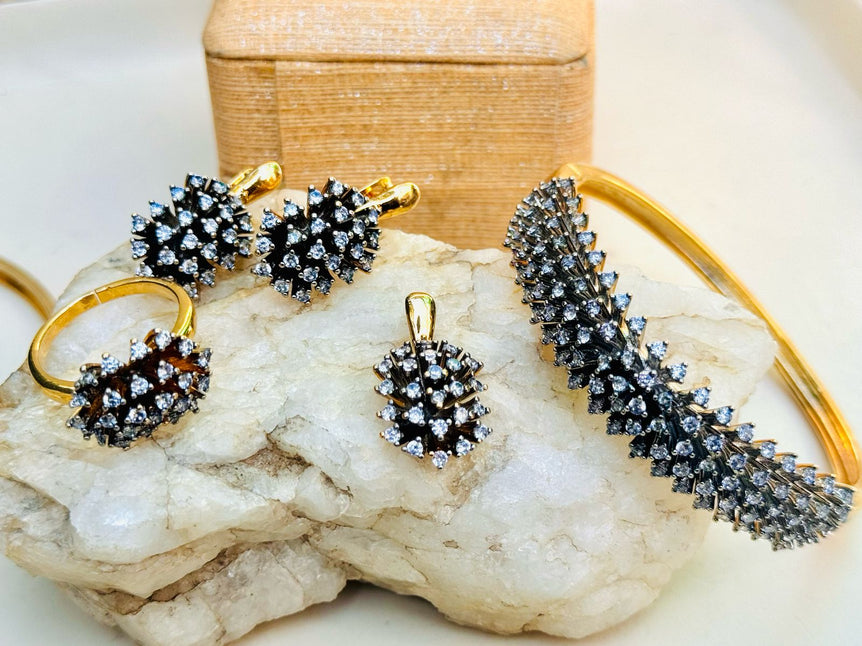 18 KARAT GOLD PLATED WITH REAL ZIRCONS